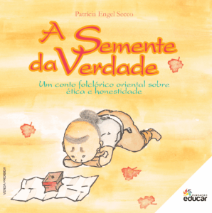 Imagem da capa do livro A Semente da Verdade. Vê-se a ilustração de um menino com características asiáticas, vestindo um Chong Kraben, traje típico tailandês. O garoto observa uma pequena caixa. Lê-se: "A Semente da Verdade - Um conto folclórico oriental sobre ética e honestidade"; "Autora: Patrícia Engel Secco"; "Editora: Fundação Educar".
